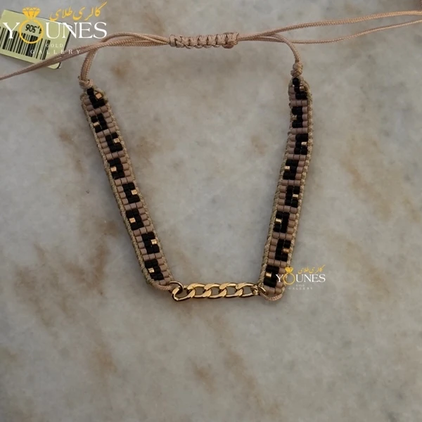 دستبند میوکی مربع مشکی کارتیر طلا